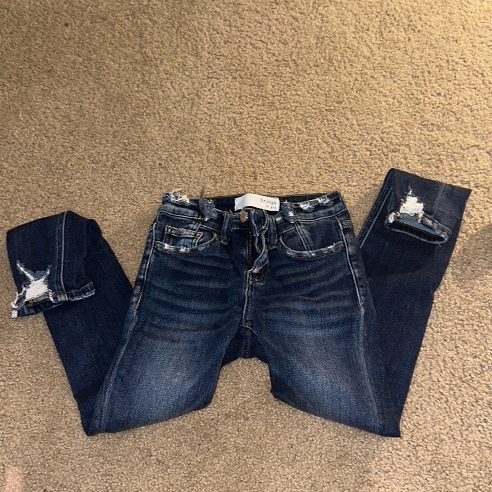 Buckle super skinny mid rise cut offs brand new. Size 23 women’s.